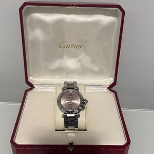 Cartier Silver Timepiece with Pink Face
